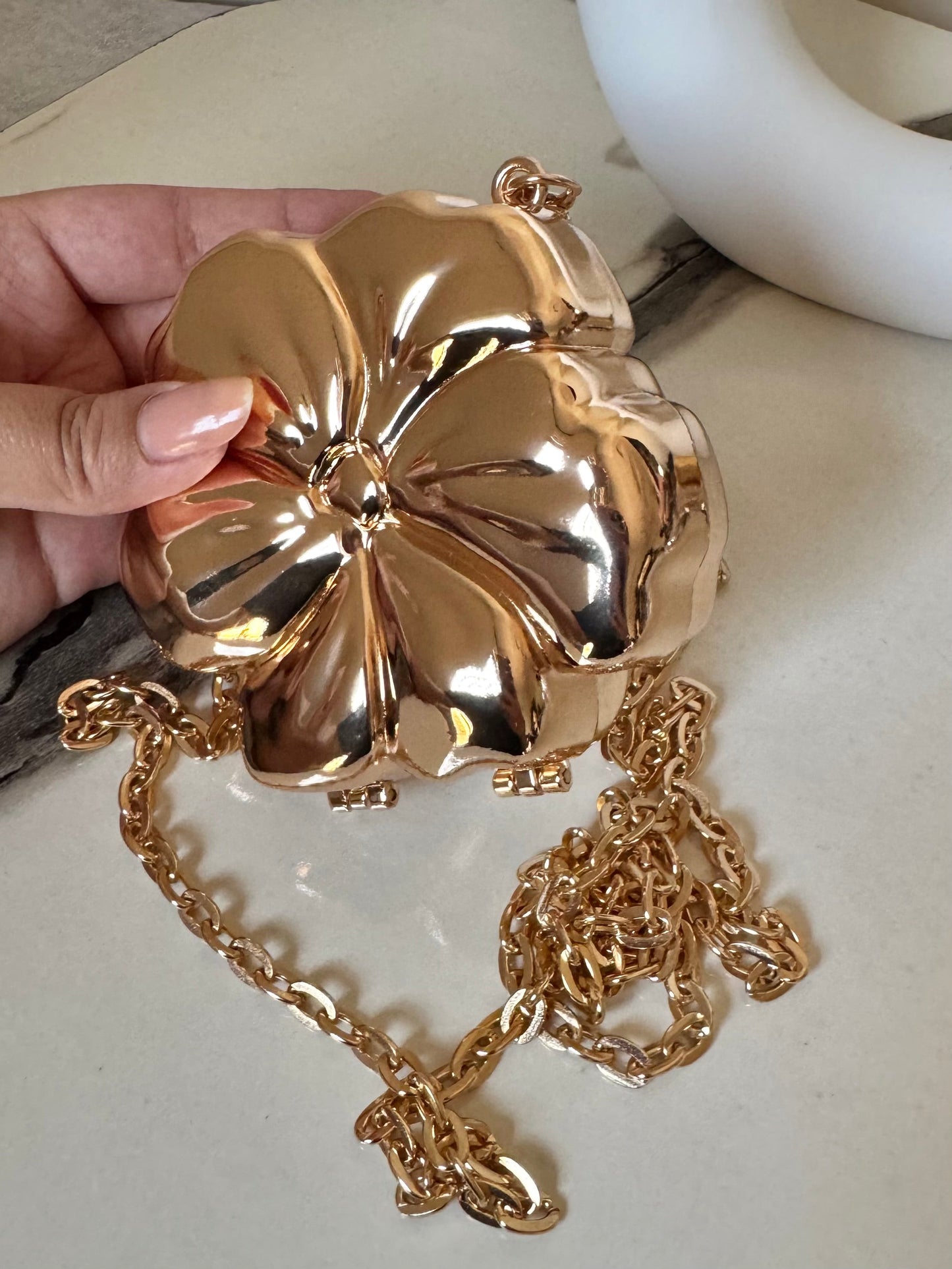 LuxeBloom Metallic Clutch