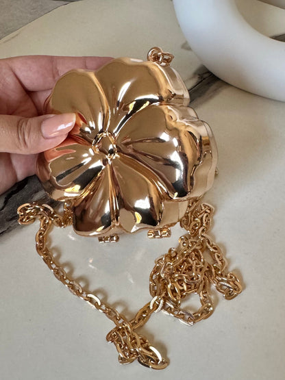LuxeBloom Metallic Clutch