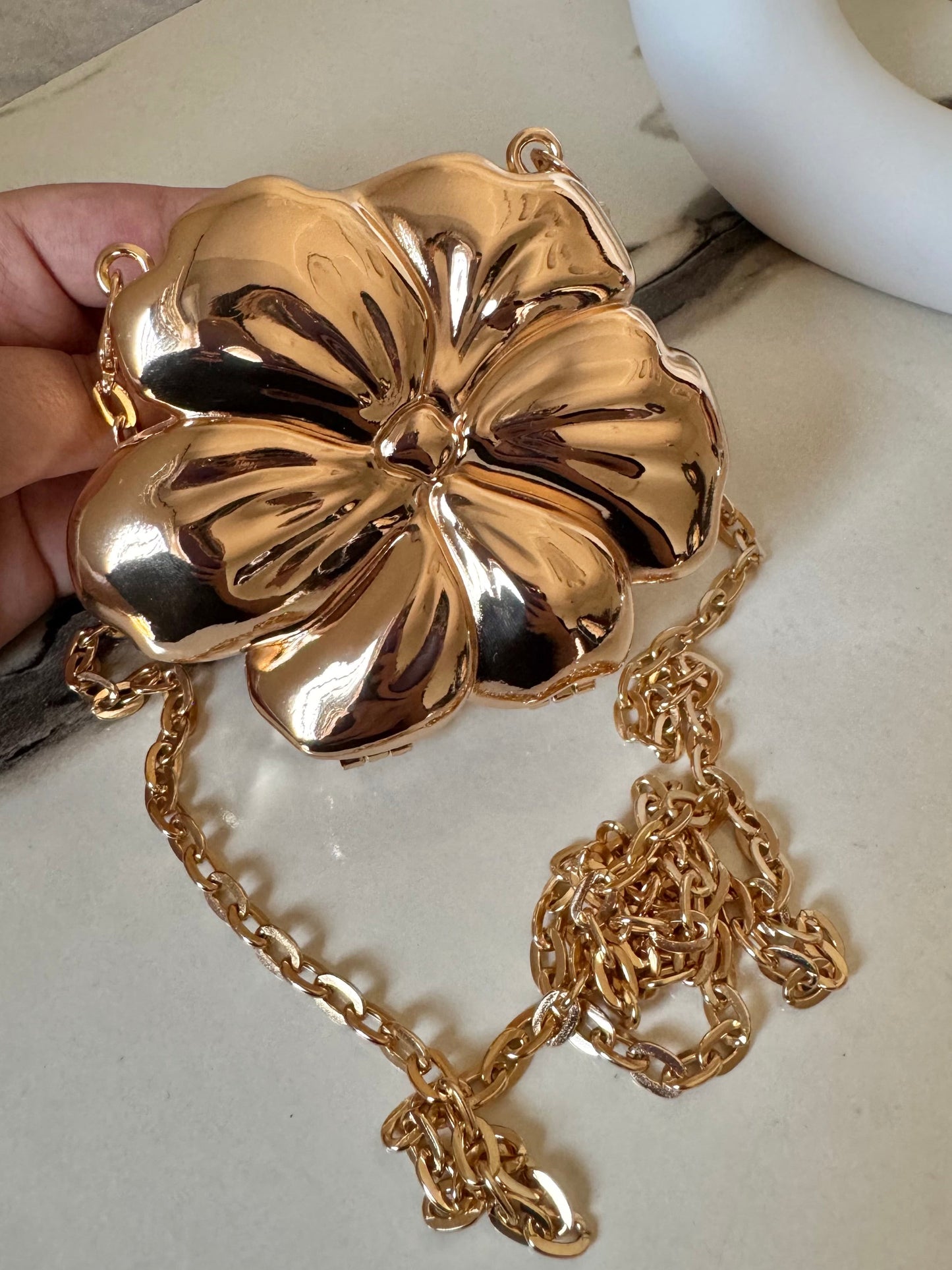 LuxeBloom Metallic Clutch